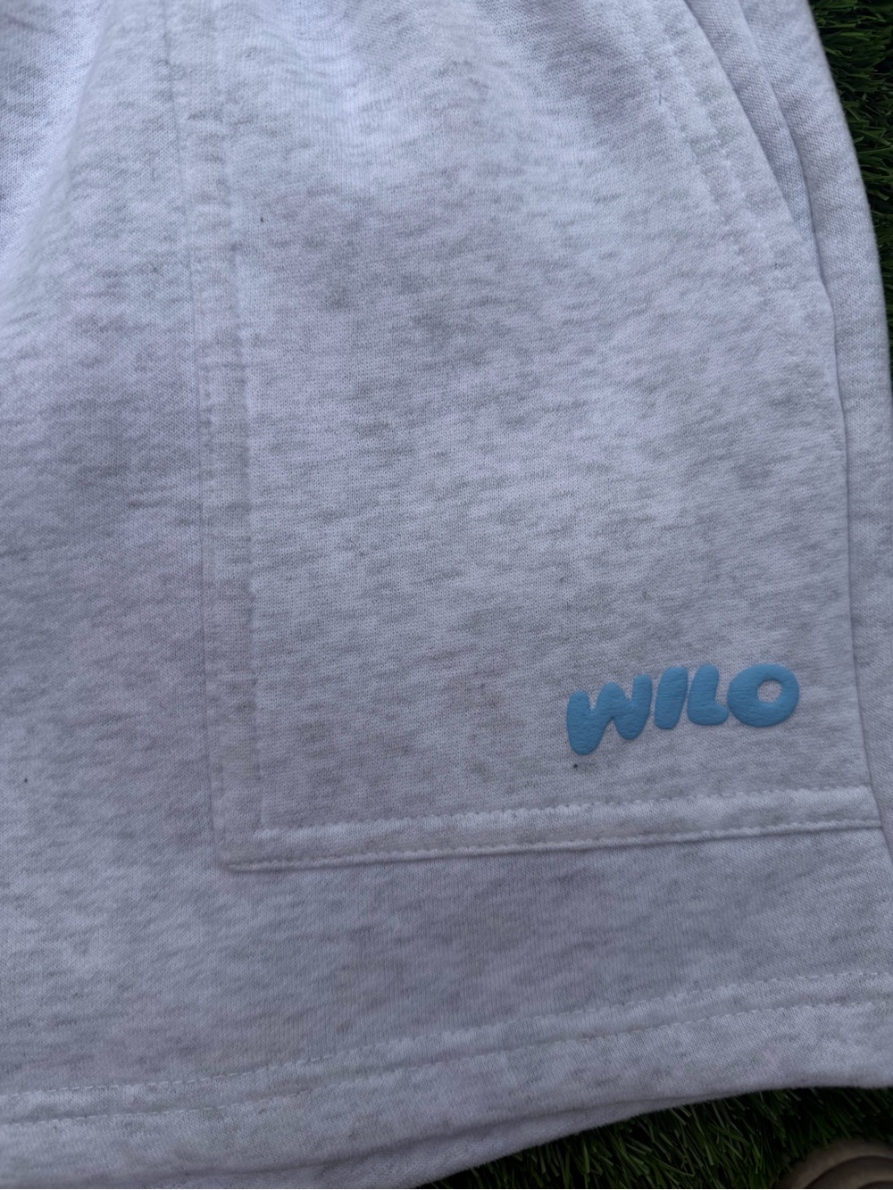Wilo Women's Light Gray Athletic Shorts with Blue Logo